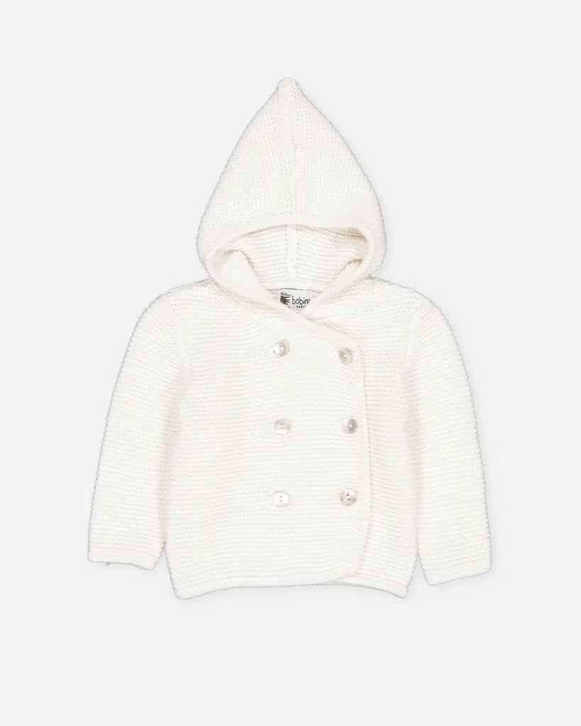 Veste bébé à capuche en maille écru de la marque Bobine Paris.