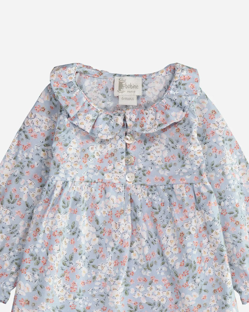 Zoom de la blouse grise fleurie à manches longues en coton Oeko-Tex pour bébé fille de la marque Bobine Paris.