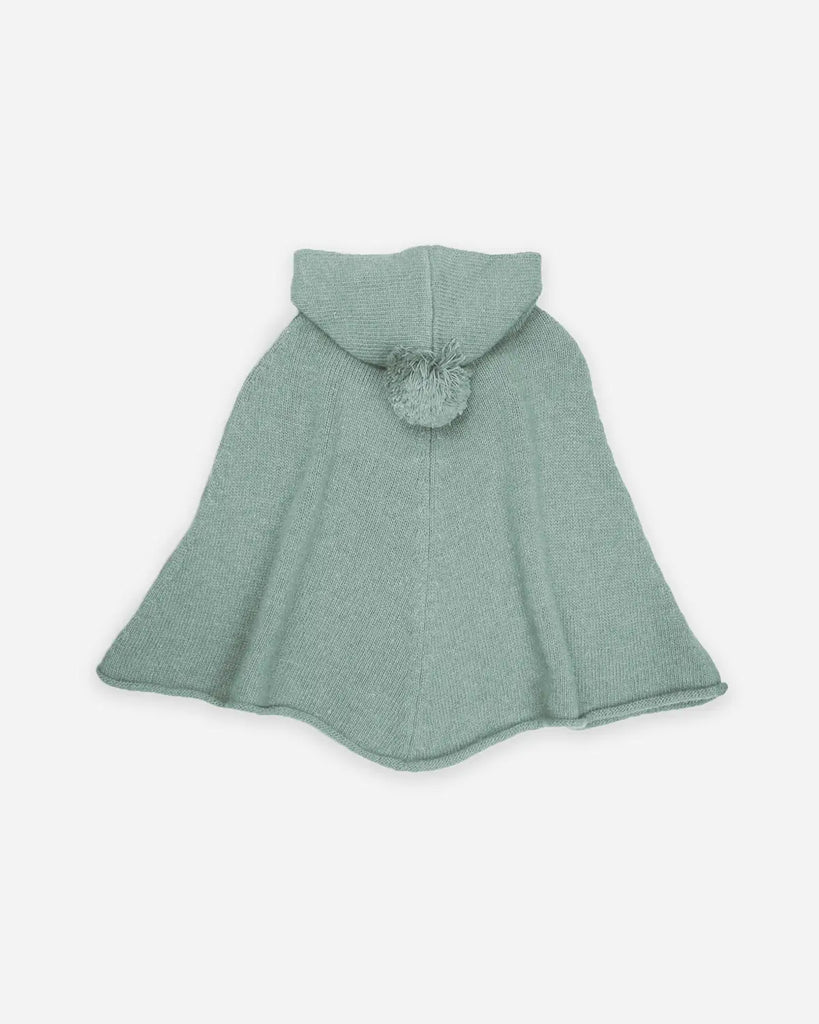 Vue de dos du poncho vert amande à capuche pour bébé de la marque Bobine Paris.