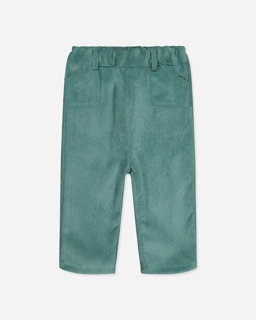 Pantalon pour bébé en velours côtelé vert amande de la marque Bobine Paris.