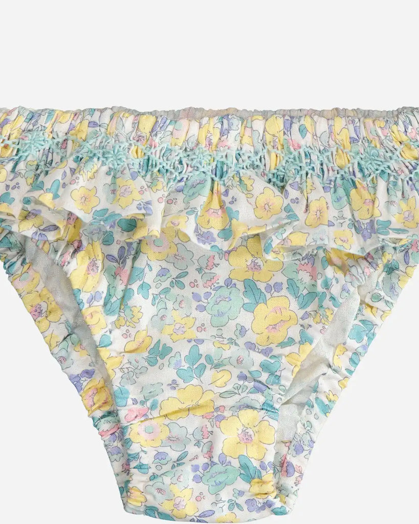 Zoom de la culotte de bain à broderies émeraude et jaune pour bébé fille de la marque Bobine Paris.