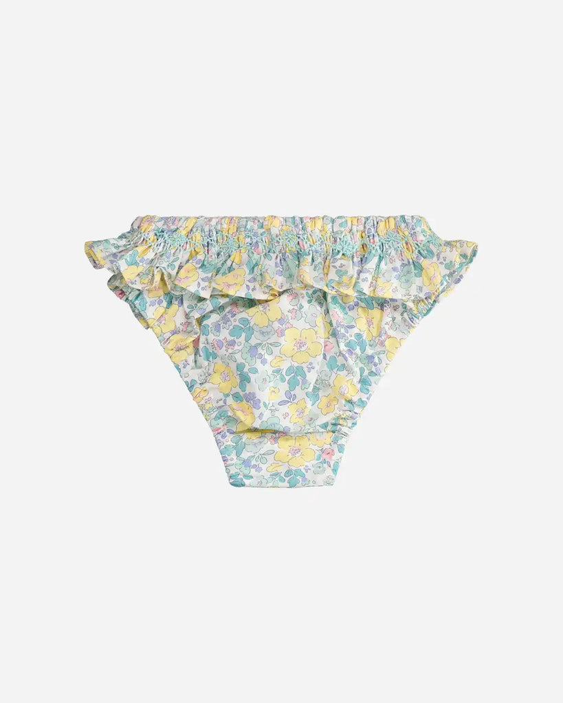 Vue de dos de la culotte de bain à broderies émeraude et jaune pour bébé fille de la marque Bobine Paris.