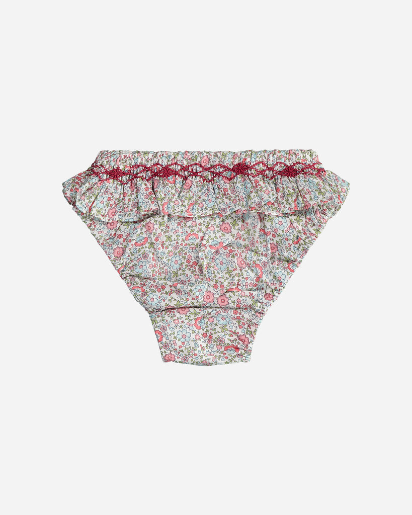 Vue de dos de la culotte de bain pour bébé fille à volants et motif fleuri de la marque Bobine Paris.
