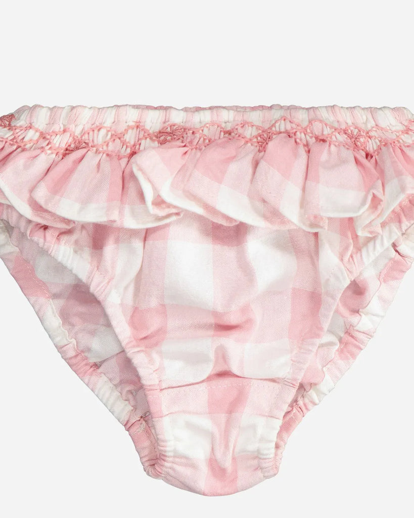 Zoom de la culotte de bain pour bébé fille à motif vichy rose de la marque Bobine Paris.