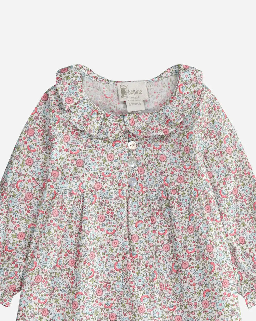 Zoom de la blouse manches longues à imprimé fleuri printanier en coton Oeko-Tex pour bébé fille de la marque Bobine Paris.
