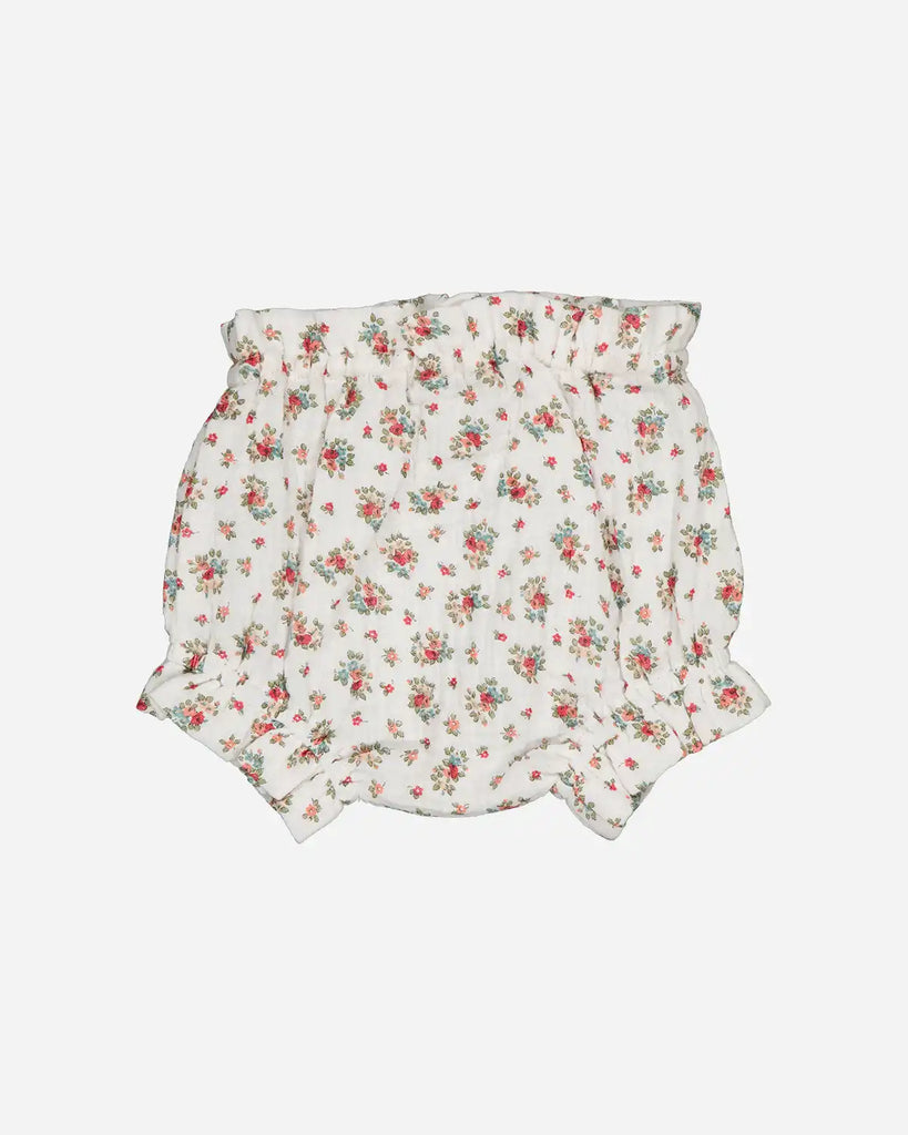 Vue de dos du bloomer blanc pour bébé fille à fleurs rouges de la marque Bobine Paris.