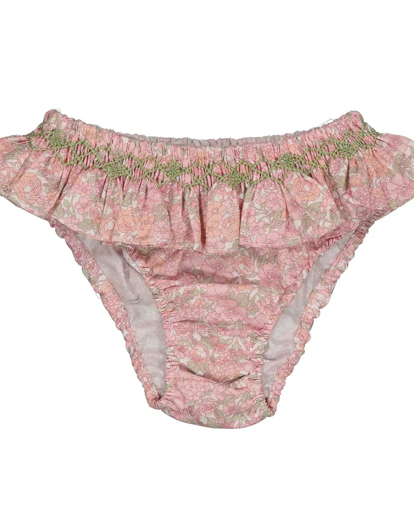 Zoom de la culotte de bain à froufrous et motifs fleuris pour bébé fille de la marque Bobine Paris.