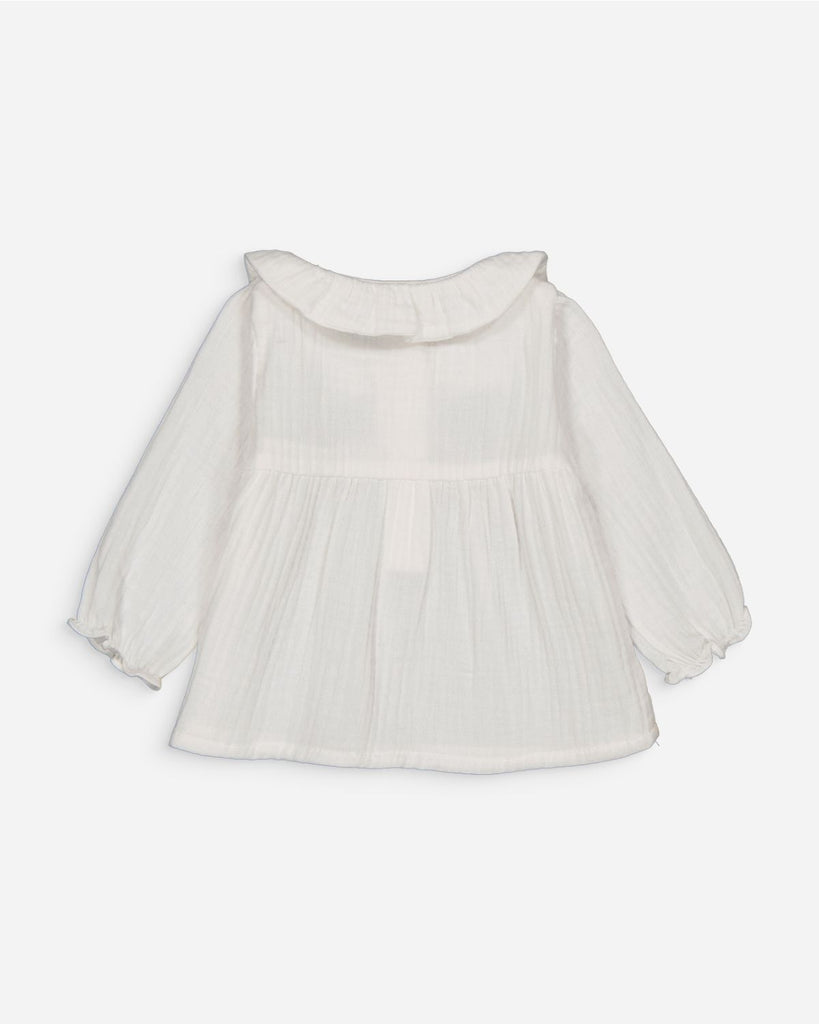 Vue de dos de la chemise bébé fille en gaze de coton écru de a marque Bobine Paris.