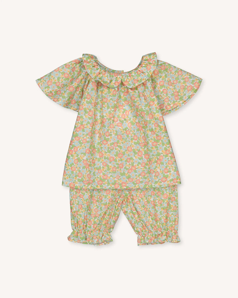 Look pour bébé composé d'une blouse volantée fleurie et d'un panty assorti de la marque Bobine Paris.
