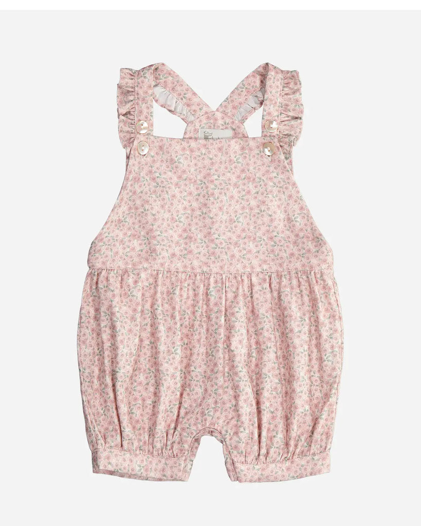 Salopette pour bébé fille courte blanche fleurie rose en gaze de coton de la marque Bobine Paris.
