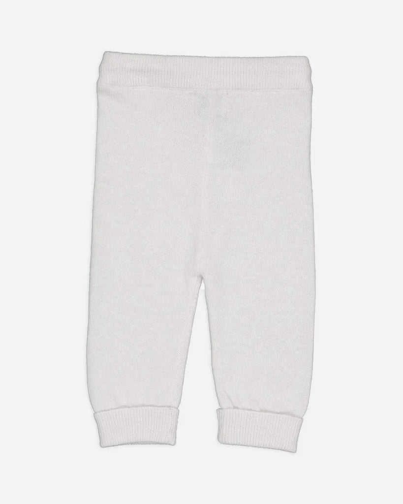 Vue de dos du pantalon pour bébé en laine et cachemire couleur perle de la marque Bobine Paris.