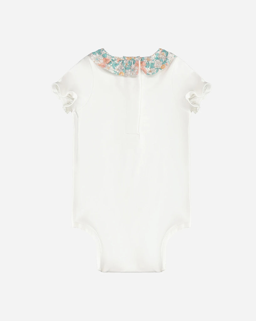 Vue de dos du body pour bébé fille banc à col volanté à fleurs vert amande et corail de la marque Bobine Paris.